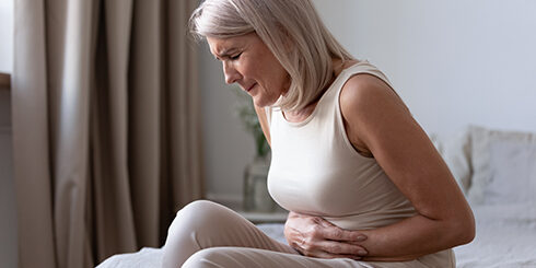 Woman with stomach pain